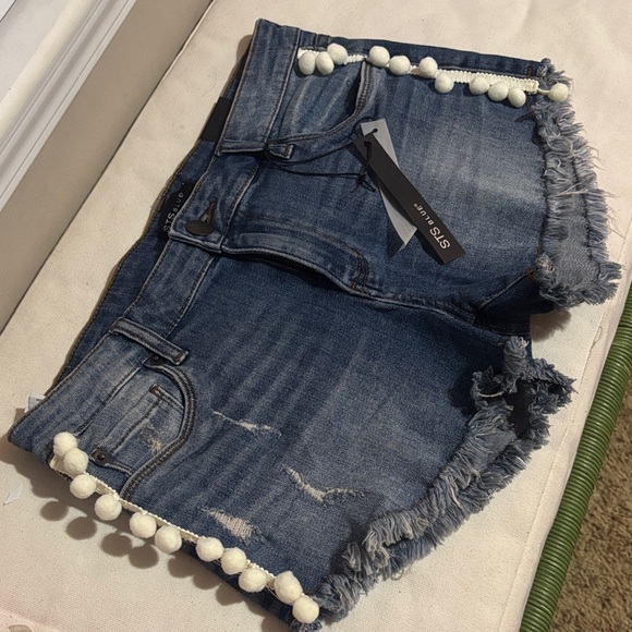STS Blue Pants - STS Blue Distressed Denim Shorts with Pom-Poms New with tags size 29